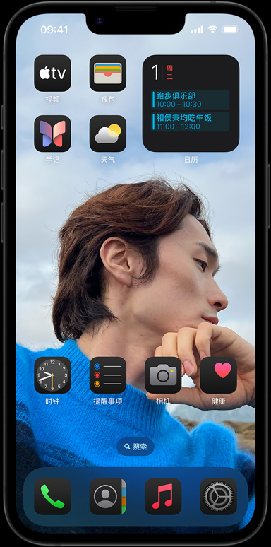 iPhone 16e 周围环绕着邮件、爱奇艺、Safari 浏览器、天气、音乐、照片、备忘录和家庭等各种 app